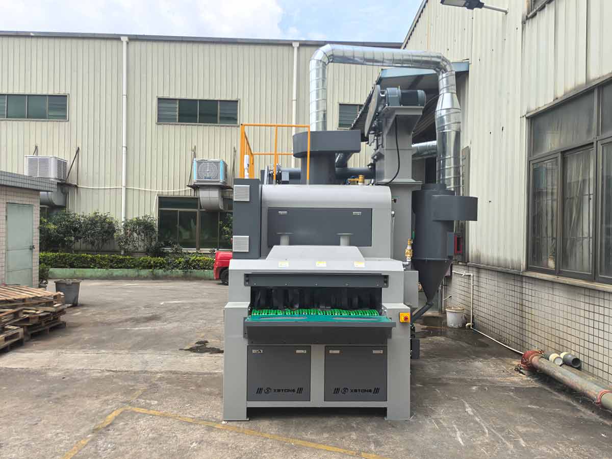 深圳百超機(jī)械生產(chǎn)的輸送式自動噴砂機(jī)實(shí)拍圖片